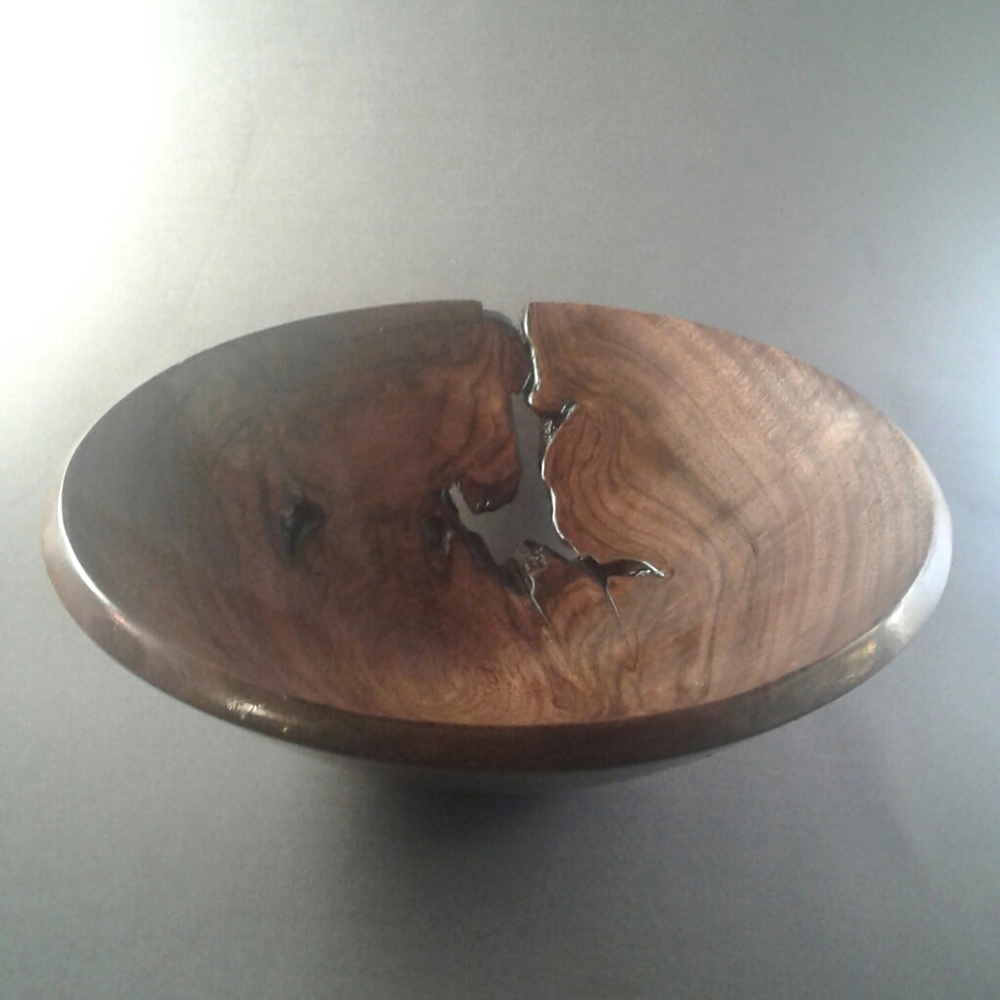 Beautiful Hand crafted wood Turned walnut bowl.